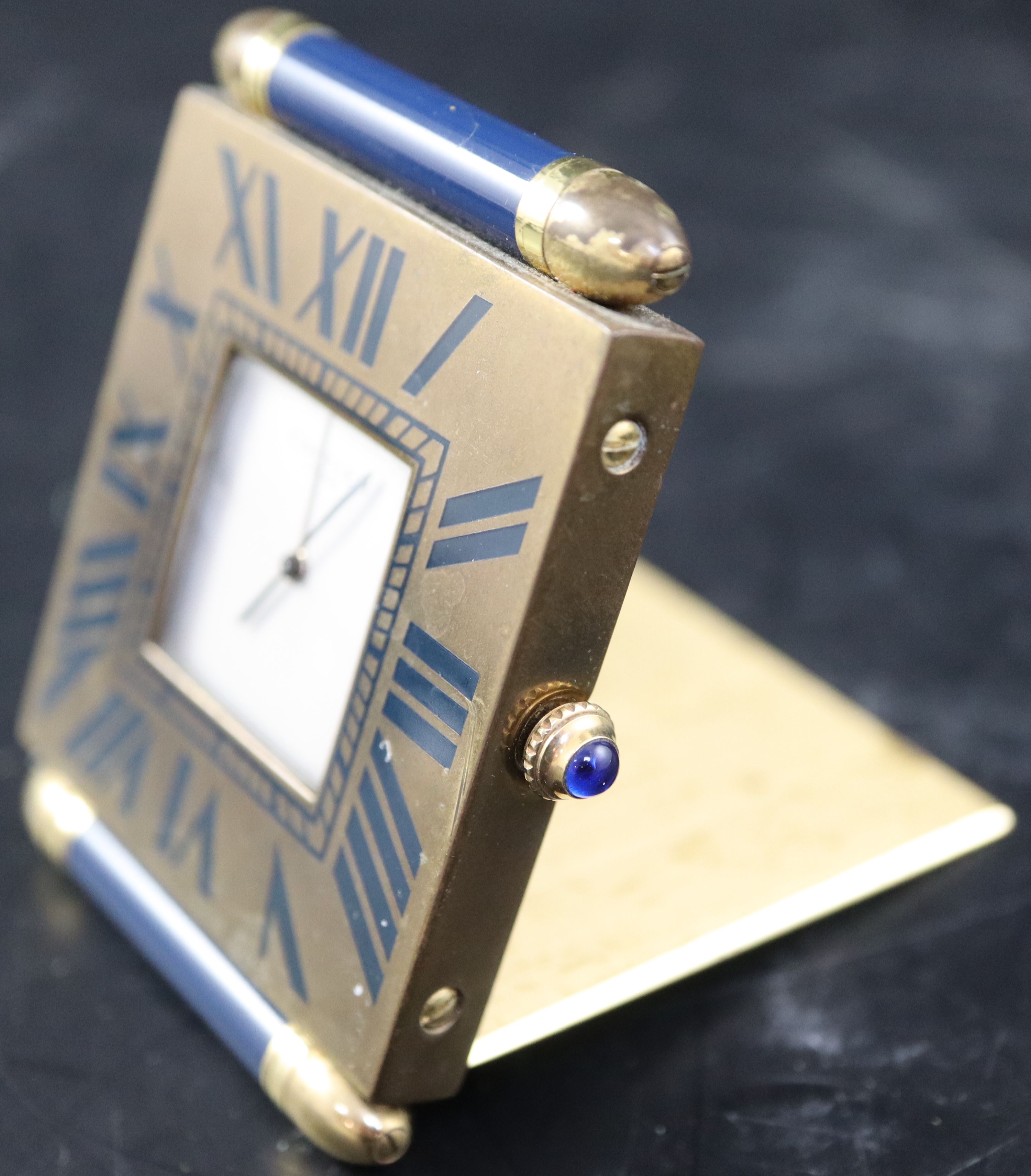 A late 20th century Cartier of Paris blue enamel and gilt brass quartz travelling timepiece, width 5cm height 6.25cm